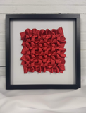 Red Clover Twists, framed in black