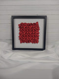 Red Clover Twists, framed in black