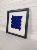 Royal Blue Dense Arrow Rings, framed in black