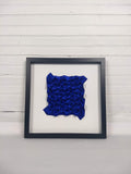 Royal Blue Dense Arrow Rings, framed in black